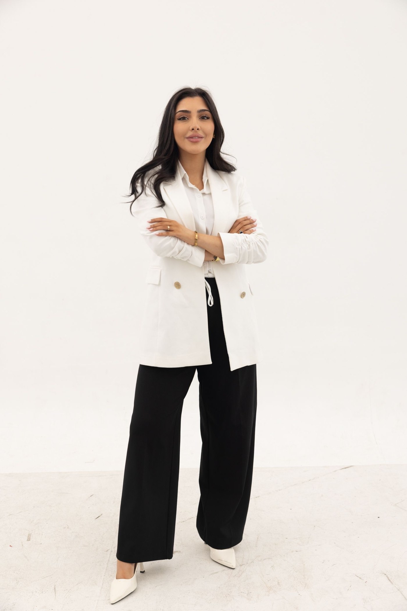 Niki Bahrehmand, founder of Women In Law, in a white blazer